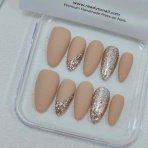 Matte Almond nails in Peach Gold Glitter