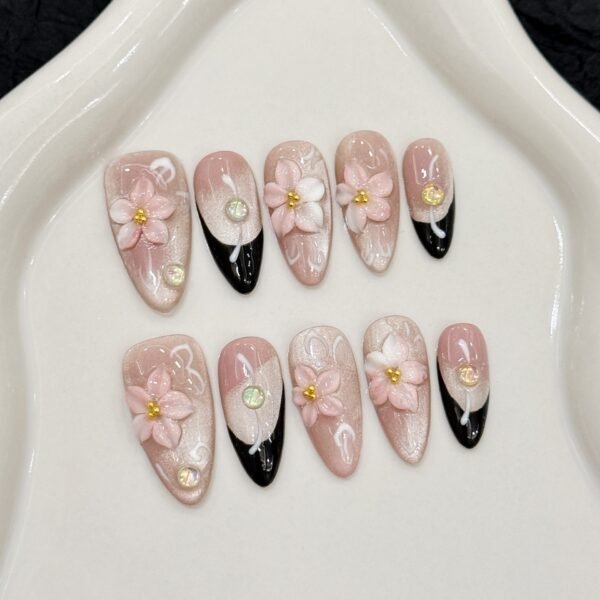 almond shape press on nails with 3D floral and black french tip