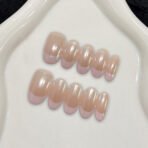 Pearl French tip press-on nails almond shape nude base pink tips glossy pearlescent handmade design