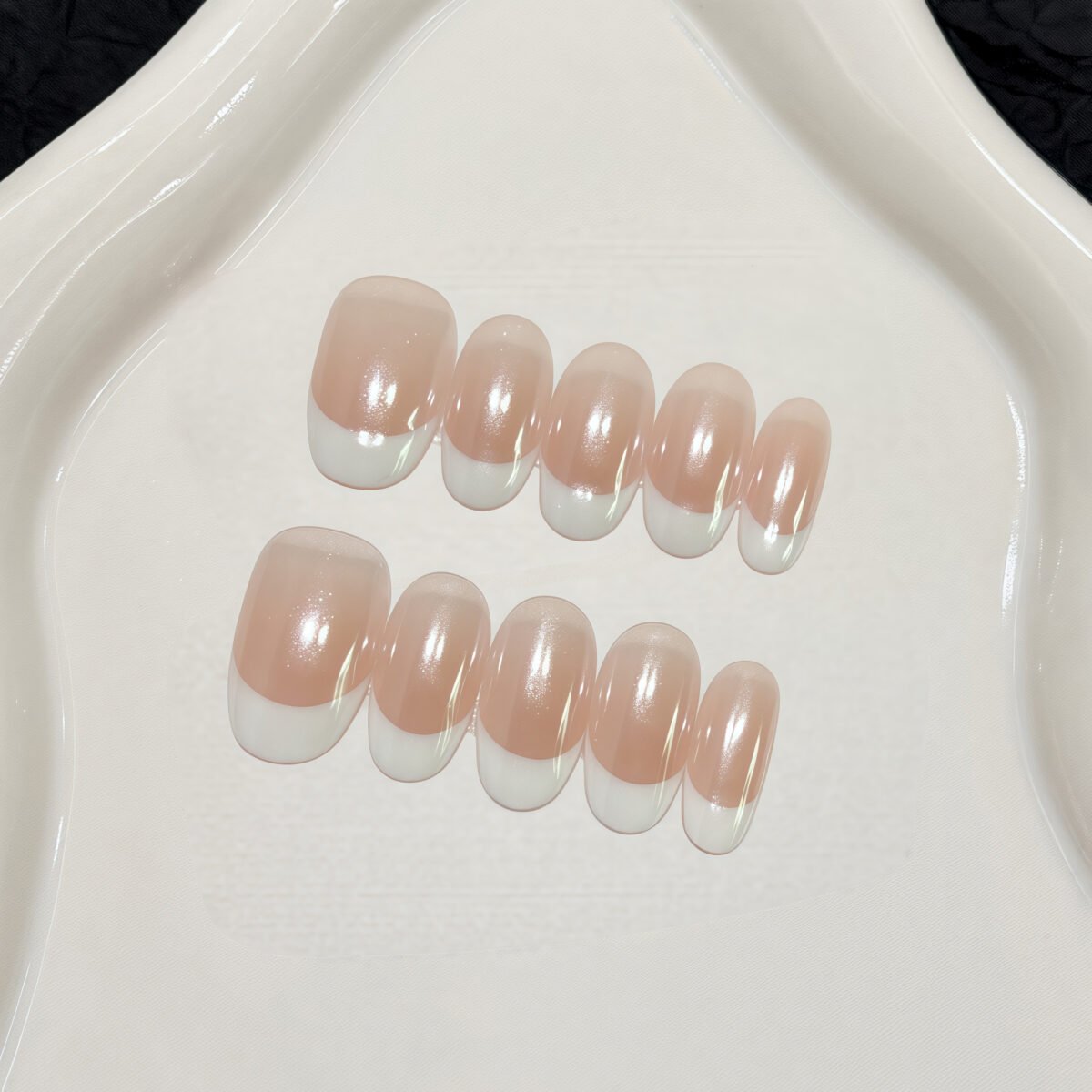 Natural French tip press-on nails almond shape nude base white tips pearl finish glossy handmade design