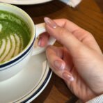 Pearl French tip press-on nails almond shape nude base pink tips glossy pearlescent handmade design